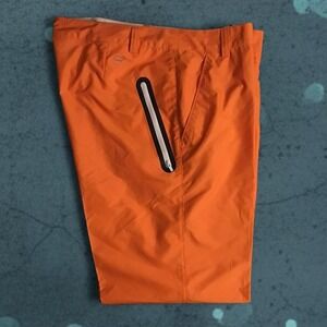 Orange Puma golf pants  zipper pocket size 36x32